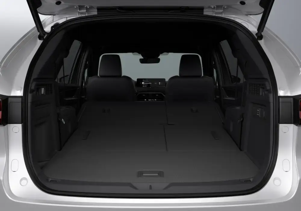 Mazda CX-90 con tercera fila abatida para carga en un SUV de 3 filas de asientos.